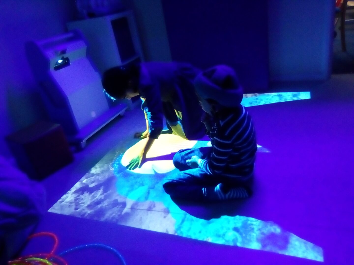interactive floor being used by children from a special education needs and disabilities environment