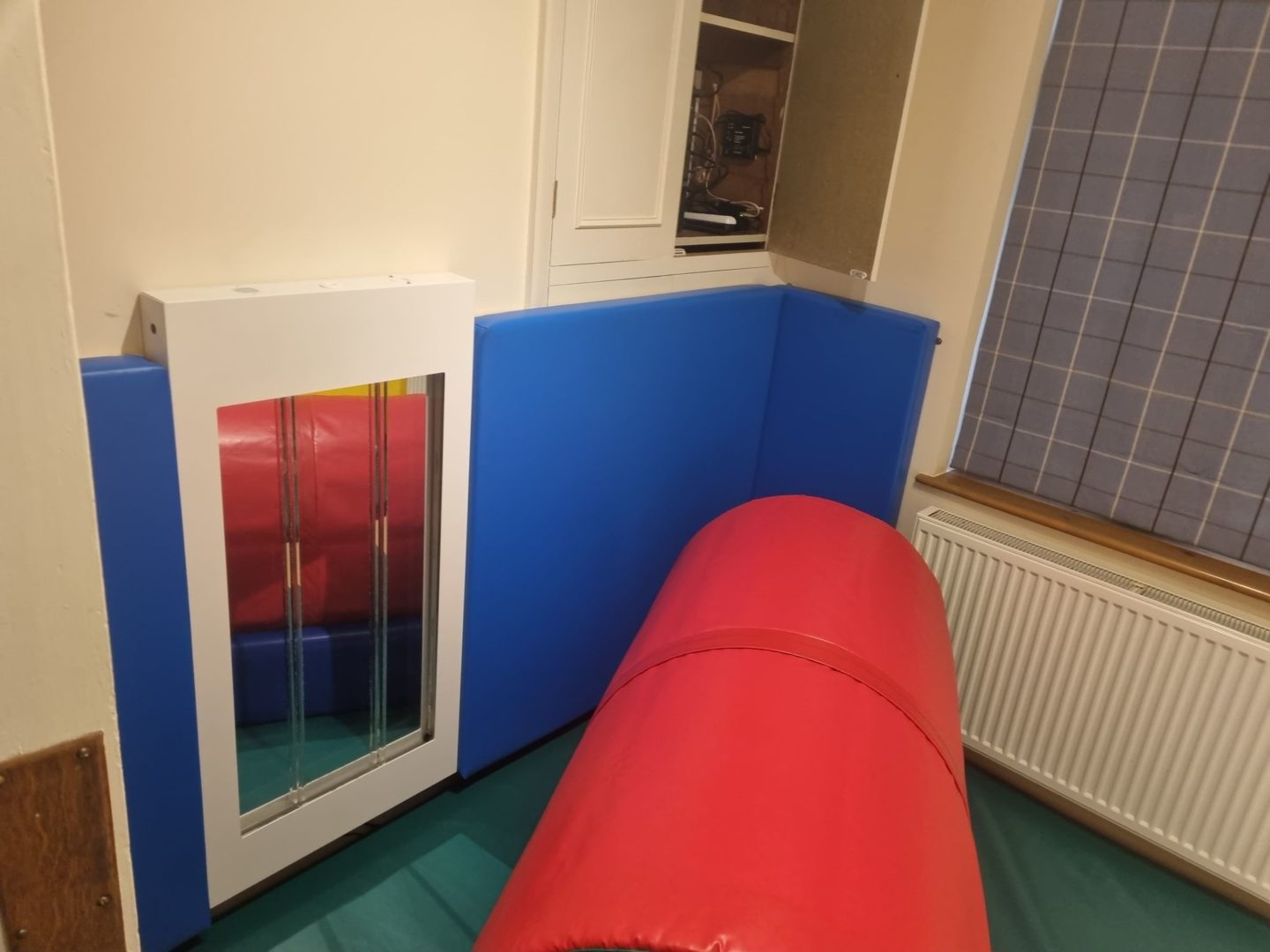 Custom designed soft padded Sensory room complete with bubble wall and activity tunnel