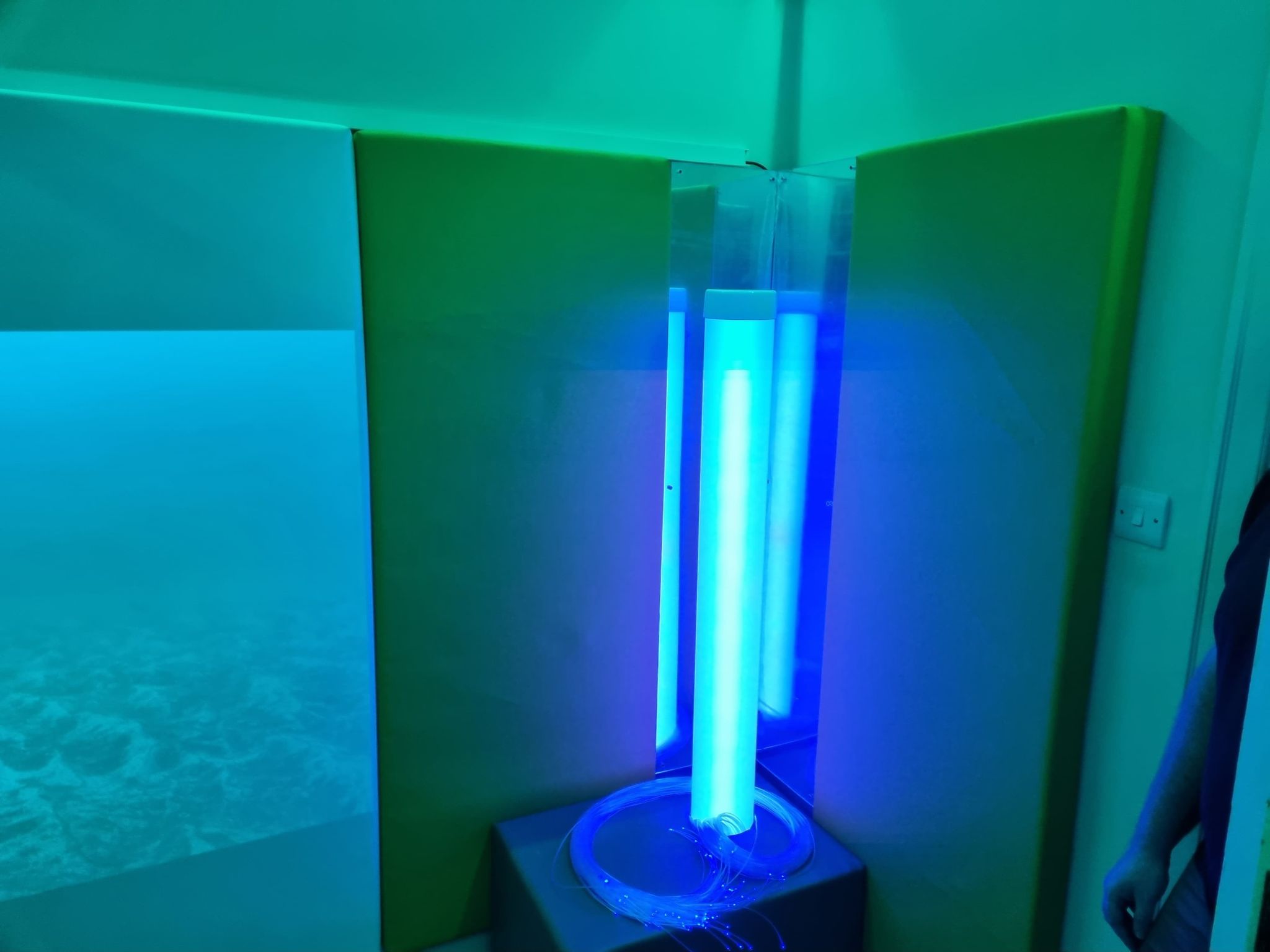 interactive light tube in soft padded plinth incorporating rgb fibre optic strands